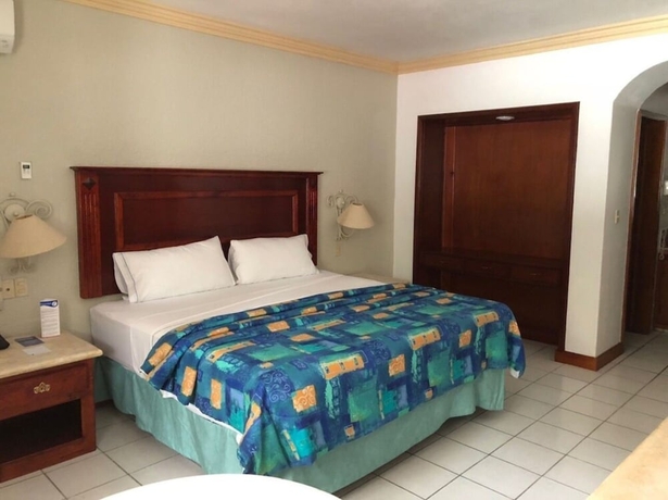 Imagen de la habitación del Hotel Maria Isabel. Foto 15