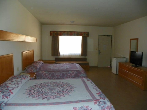 Imagen de la habitación del Hotel Maria Luisa Inn and Suites. Foto 4