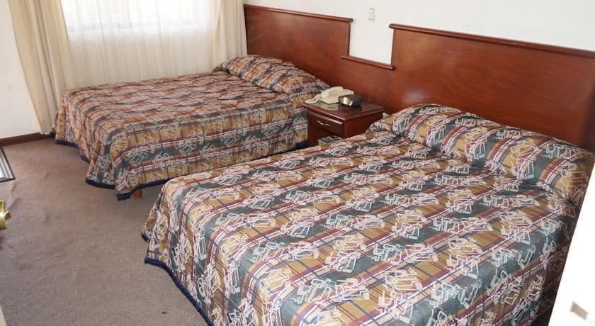 Imagen de la habitación del Hotel Maria Luisa Inn and Suites. Foto 8