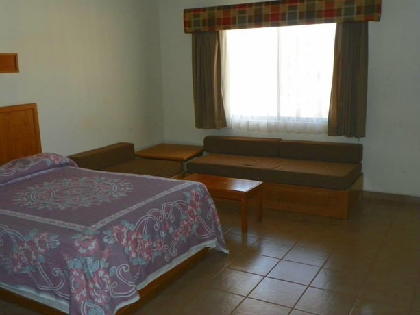 Imagen de la habitación del Hotel Maria Luisa Inn and Suites. Foto 9