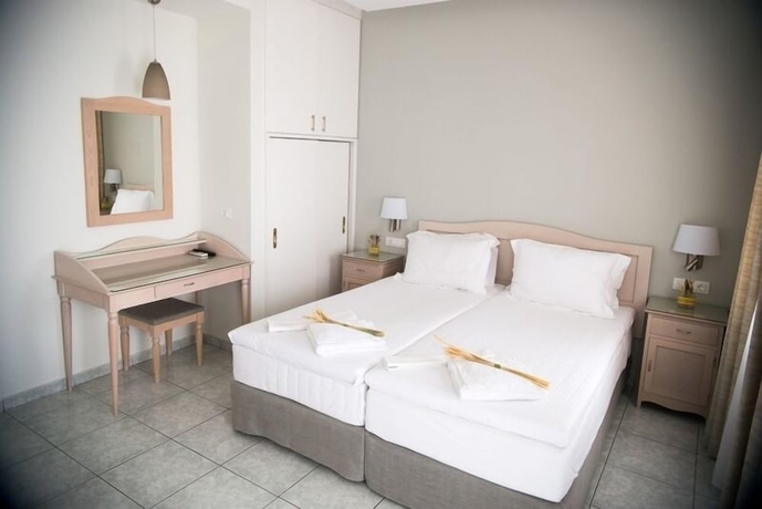 Imagen de la habitación del Hotel Maria Plomari Apartments. Foto 9