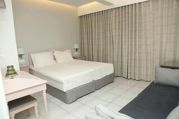 Imagen de la habitación del Hotel Maria Plomari Apartments. Foto 10