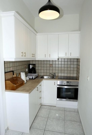 Imagen de la habitación del Hotel Maria Plomari Apartments. Foto 13