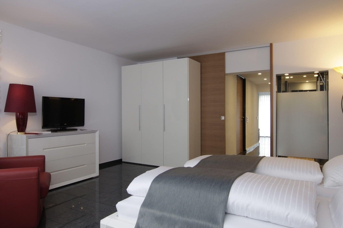 Imagen de la habitación del Hotel Maria Suite. Foto 6