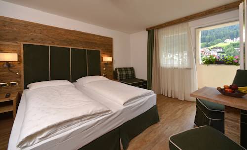 Imagen de la habitación del Hotel Maria, Val Gardena. Foto 10