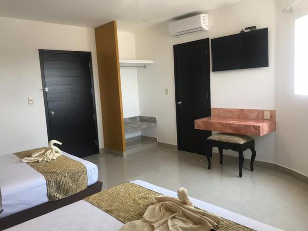 Imagen de la habitación del Hotel Maria del Rocio. Foto 4