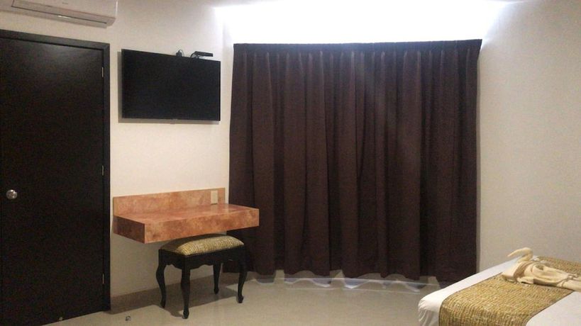 Imagen de la habitación del Hotel Maria del Rocio. Foto 10