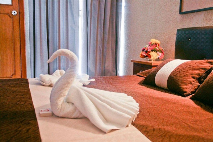 Imagen de la habitación del Hotel María De La Luz. Foto 2