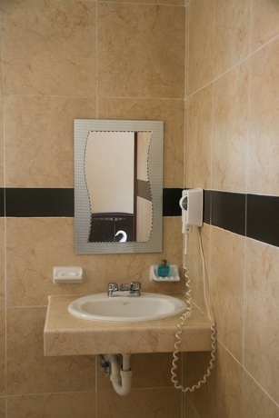 Imagen de la habitación del Hotel María De La Luz. Foto 7