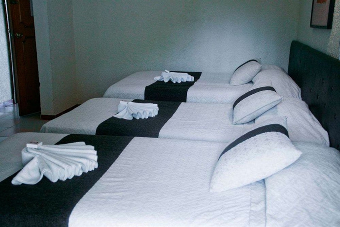 Imagen de la habitación del Hotel María De La Luz. Foto 11