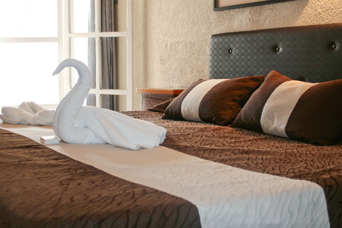 Imagen de la habitación del Hotel María De La Luz. Foto 14