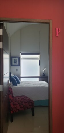 Imagen de la habitación del Hotel Marialicia Suites. Foto 12