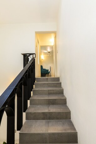 Imagen de la habitación del Hotel Marialicia Suites. Foto 17