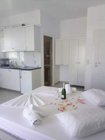 Imagen de la habitación del Hotel Mariana Apartments. Foto 16