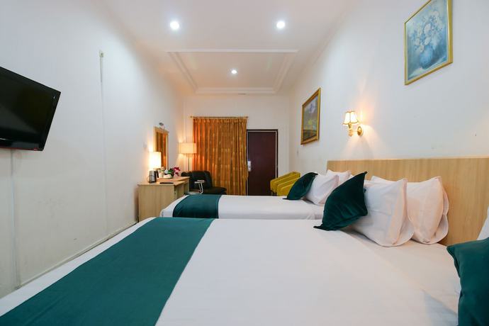 Imagen de la habitación del Hotel Mariani International. Foto 8