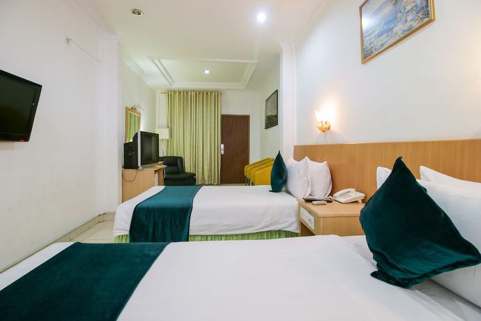 Imagen de la habitación del Hotel Mariani International. Foto 13