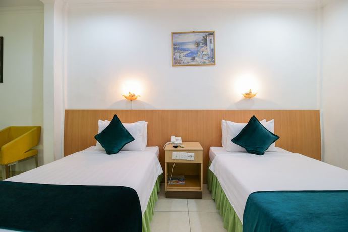 Imagen de la habitación del Hotel Mariani International. Foto 16
