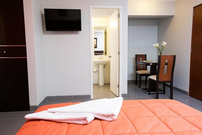 Imagen de la habitación del Hotel Mariategui and Suites. Foto 6