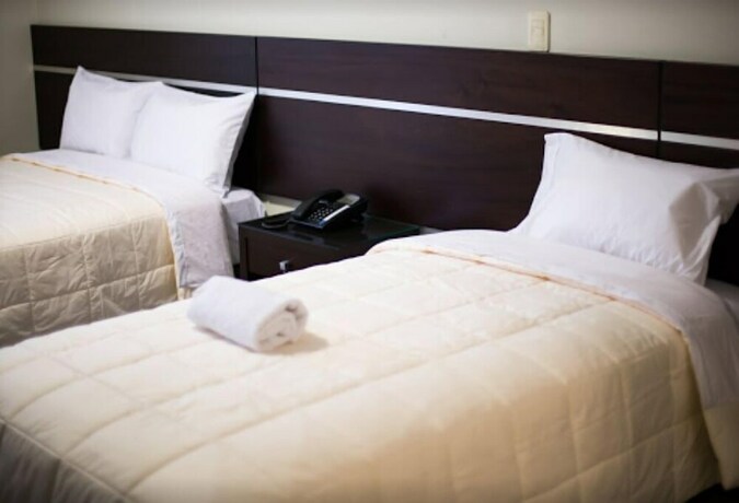 Imagen de la habitación del Hotel Mariategui and Suites. Foto 7