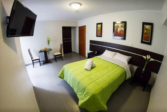 Imagen de la habitación del Hotel Mariategui and Suites. Foto 9