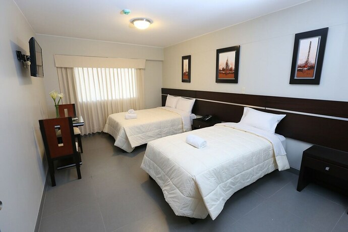 Imagen de la habitación del Hotel Mariategui and Suites. Foto 10