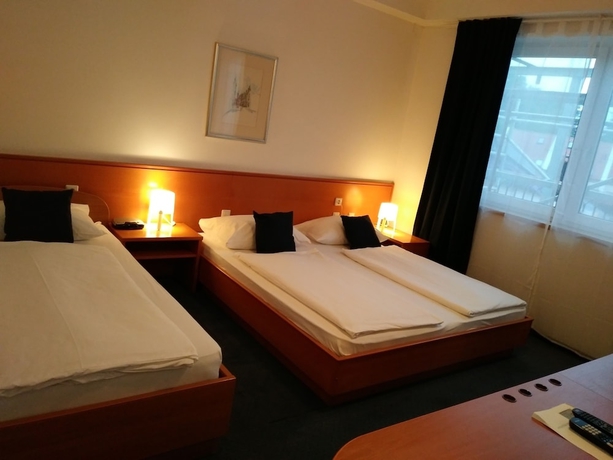 Imagen de la habitación del Hotel Maribor Inn. Foto 16