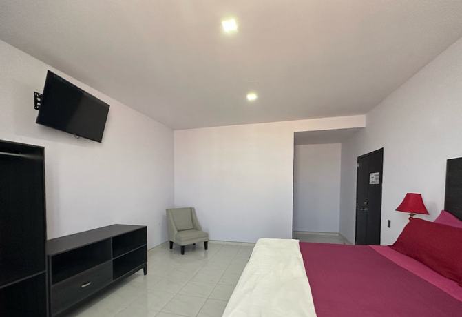 Imagen de la habitación del Hotel Maricela. Foto 12