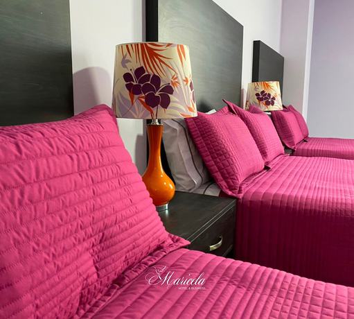 Imagen de la habitación del Hotel Maricela. Foto 15