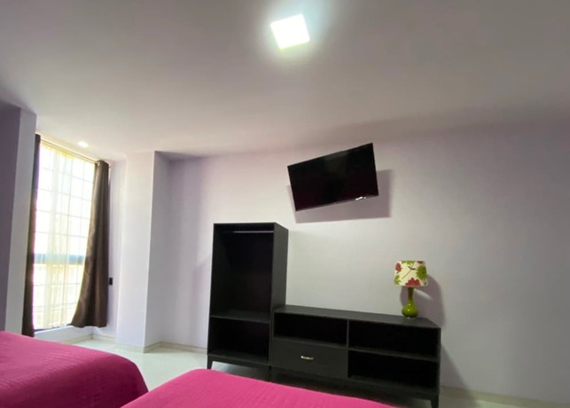 Imagen de la habitación del Hotel Maricela. Foto 16