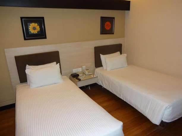Imagen de la habitación del Hotel Marigold, Hyderabad. Foto 3