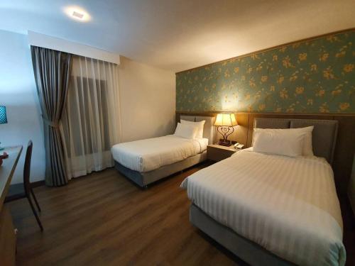 Imagen de la habitación del Hotel Marigold Lanna. Foto 8