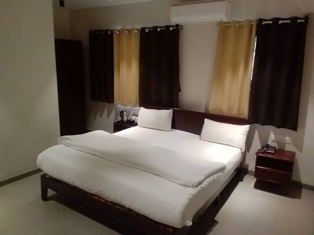 Imagen de la habitación del Hotel Marigold Mount Abu with Swimming Pool. Foto 7