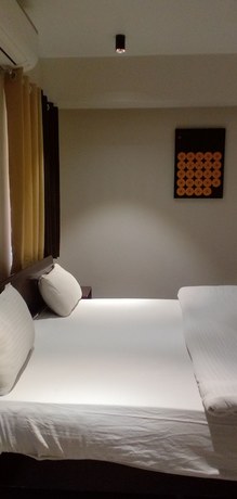 Imagen de la habitación del Hotel Marigold Mount Abu with Swimming Pool. Foto 11