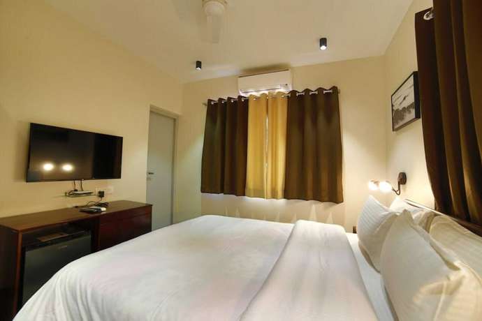 Imagen de la habitación del Hotel Marigold Mount Abu with Swimming Pool. Foto 13