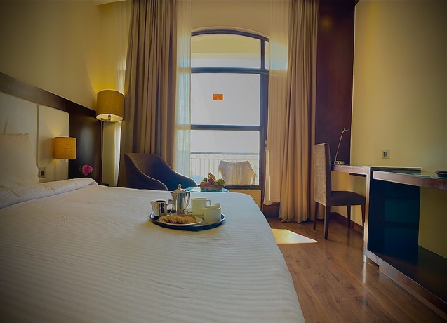 Imagen de la habitación del Hotel Marigold Sarovar Portico Shimla. Foto 3