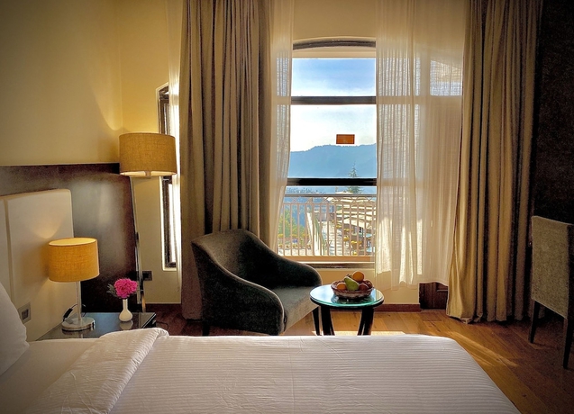 Imagen de la habitación del Hotel Marigold Sarovar Portico Shimla. Foto 5
