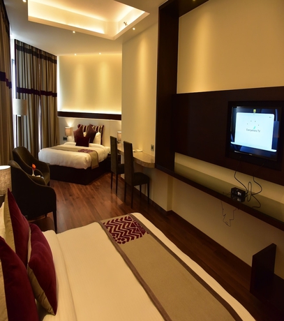 Imagen de la habitación del Hotel Marigold Sarovar Portico Shimla. Foto 6