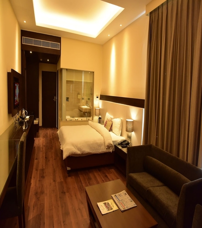 Imagen de la habitación del Hotel Marigold Sarovar Portico Shimla. Foto 7