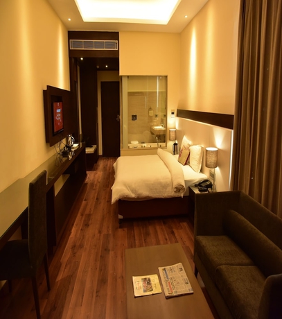 Imagen de la habitación del Hotel Marigold Sarovar Portico Shimla. Foto 9
