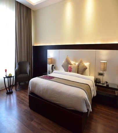 Imagen de la habitación del Hotel Marigold Sarovar Portico Shimla. Foto 10