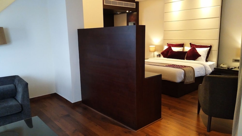 Imagen de la habitación del Hotel Marigold Sarovar Portico Shimla. Foto 15