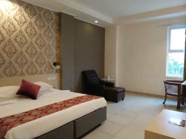 Imagen de la habitación del Hotel Marilyn Serpong. Foto 8