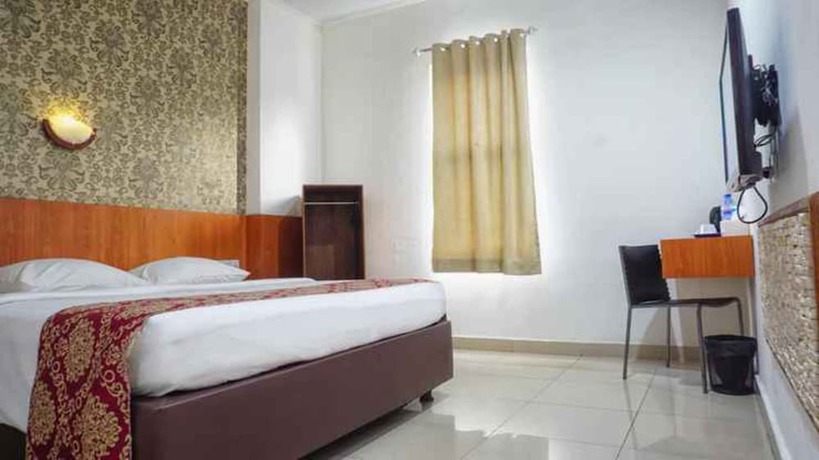 Imagen de la habitación del Hotel Marilyn Serpong. Foto 12