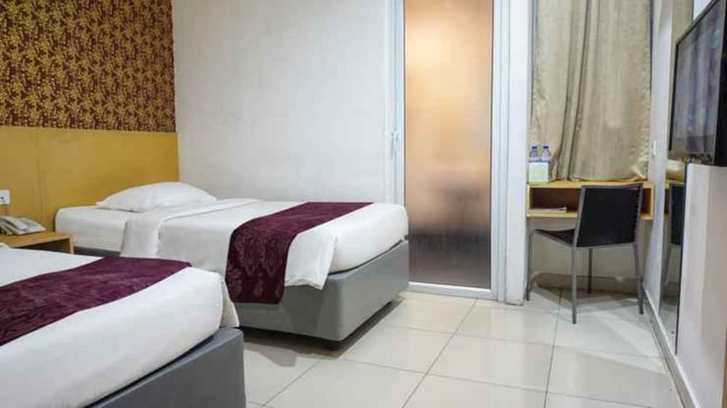 Imagen de la habitación del Hotel Marilyn Serpong. Foto 13