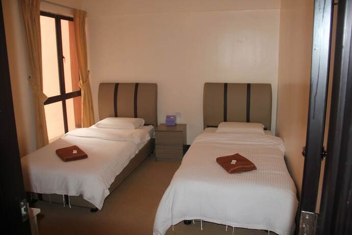 Imagen de la habitación del Hotel Marimari Marina Service Condo. Foto 7