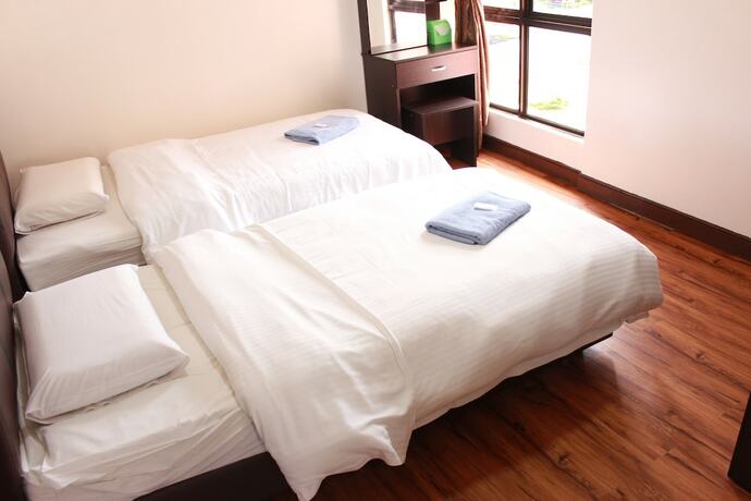 Imagen de la habitación del Hotel Marimari Marina Service Condo. Foto 18