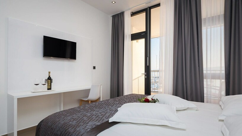 Imagen de la habitación del Hotel Marina Baotić Apartments. Foto 11