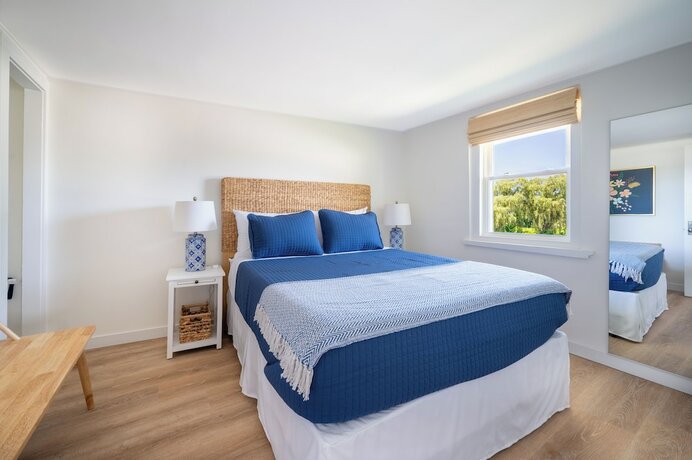 Imagen de la habitación del Hotel Marina Bay Cottages. Foto 11