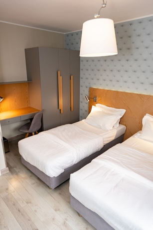 Imagen de la habitación del Hotel Marina Club Residence. Foto 17