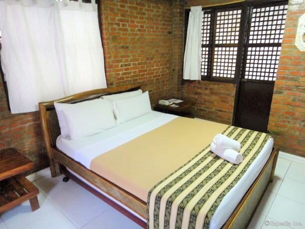 Imagen de la habitación del Hotel Marina De Bay Resort and Spa. Foto 17